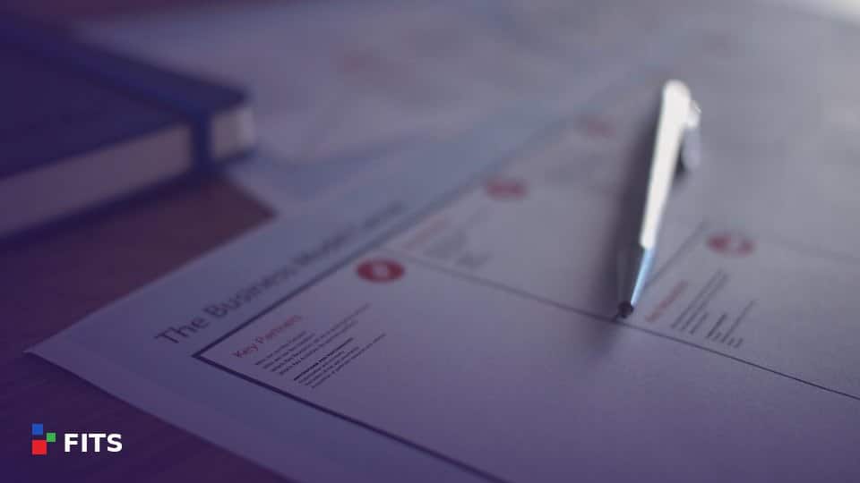 Pen resting on a business document